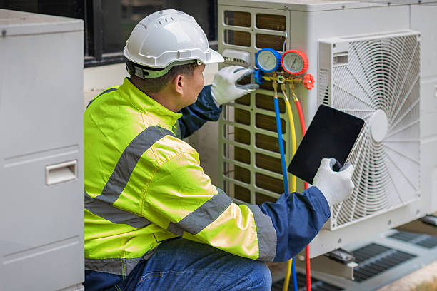 Professional Hvac technician working in Harper, KS